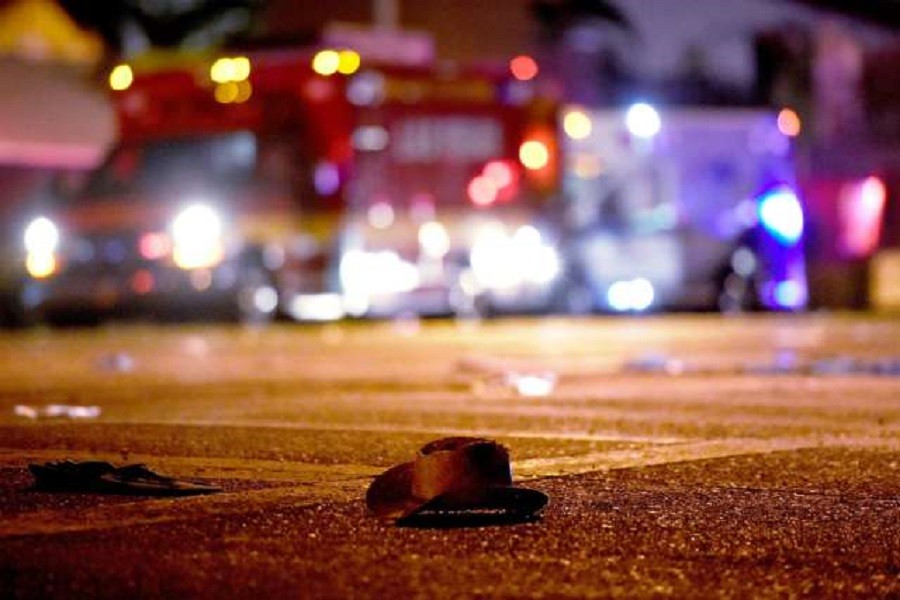 Single cowboy hat lies on the ground in the aftermath of the shooting 