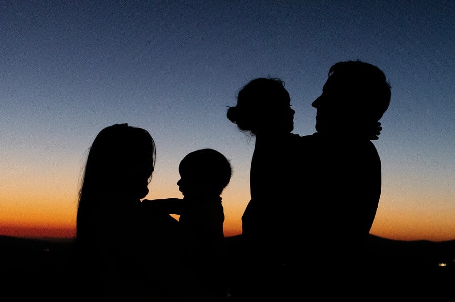family in shadow