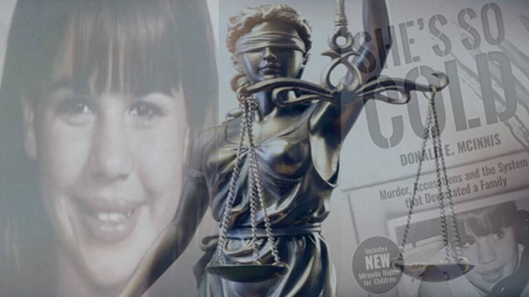 Lady of Justice model with She's So Cold book in background