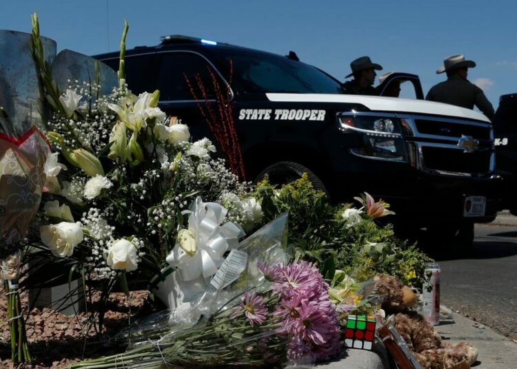 Just like the memorials after a shooting, some myths are bound to appear. AP Photo/John Locher